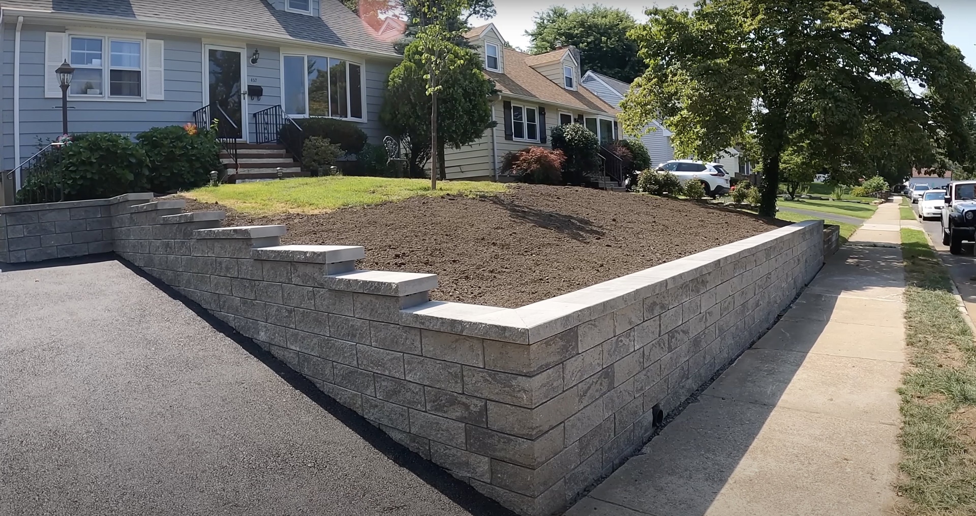 Quality concrete retaining wall construction by Southfield Concrete Construction Professional concrete retaining wall installation in Southfield showing expert construction techniques